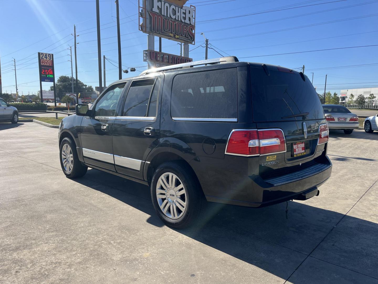 2012 black /TAN Lincoln Navigator 2WD (5LMJJ2H52CE) with an 5.4L V8 SOHC 24V engine, 6-Speed Automatic transmission, located at 14700 Tomball Parkway 249, Houston, TX, 77086, (281) 444-2200, 29.928619, -95.504074 - Photo#4