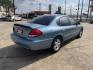 2005 blue /TAN Ford Taurus SE (1FAFP53285A) with an 3.0L V6 OHV 12V FFV engine, 4-Speed Automatic Overdrive transmission, located at 14700 Tomball Parkway 249, Houston, TX, 77086, (281) 444-2200, 29.928619, -95.504074 - Photo#15