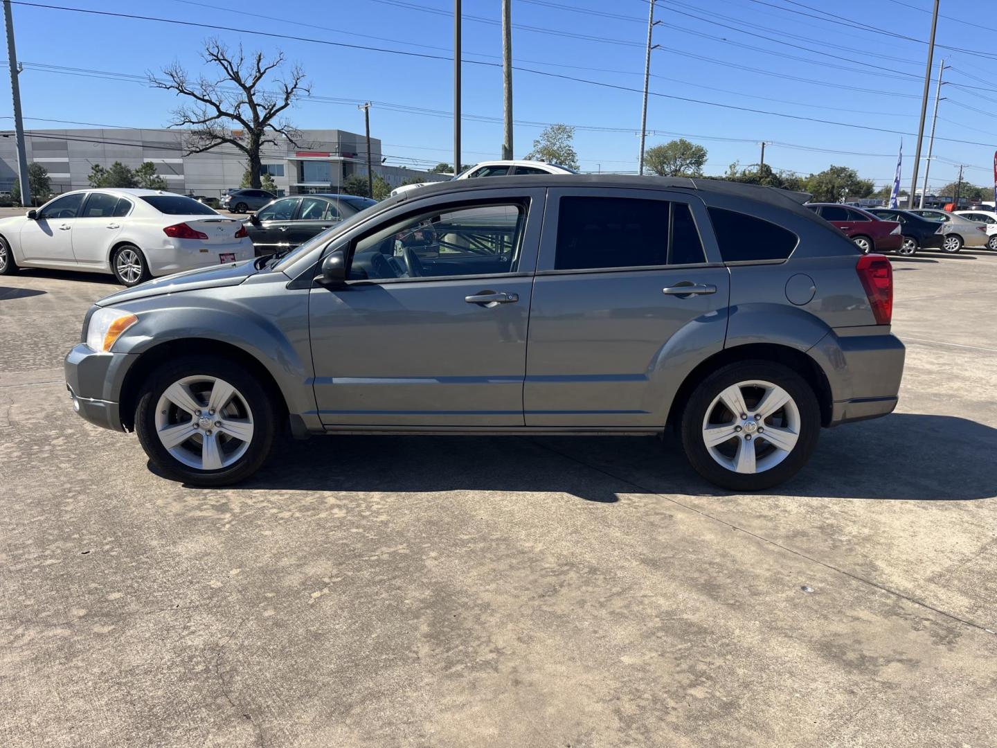 2011 GRAY /black Dodge Caliber Mainstreet (1B3CB3HA0BD) with an 2.0L L4 DOHC 16V engine, Continuously Variable Transmission transmission, located at 14700 Tomball Parkway 249, Houston, TX, 77086, (281) 444-2200, 29.928619, -95.504074 - Photo#3