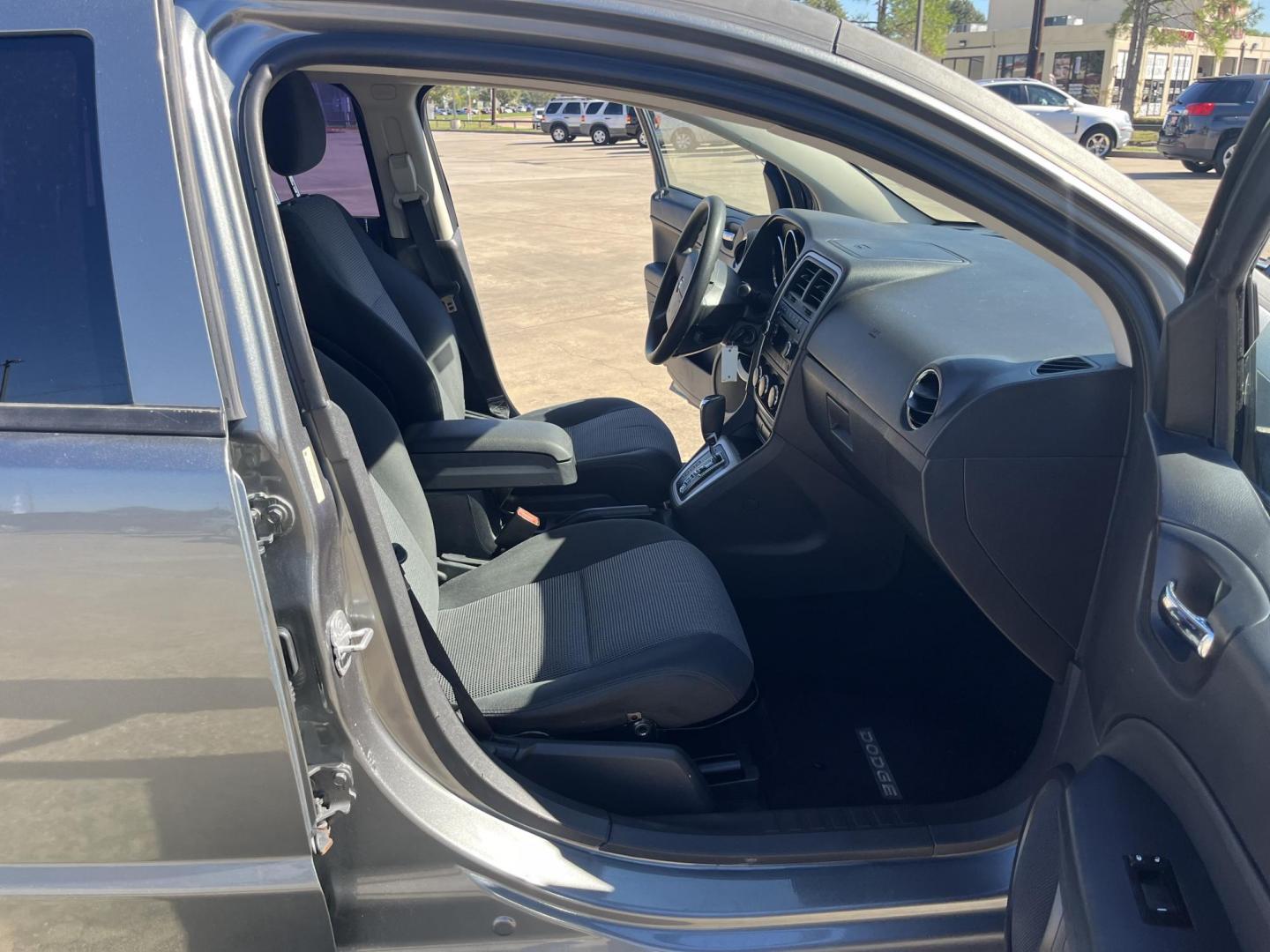 2011 GRAY /black Dodge Caliber Mainstreet (1B3CB3HA0BD) with an 2.0L L4 DOHC 16V engine, Continuously Variable Transmission transmission, located at 14700 Tomball Parkway 249, Houston, TX, 77086, (281) 444-2200, 29.928619, -95.504074 - Photo#10