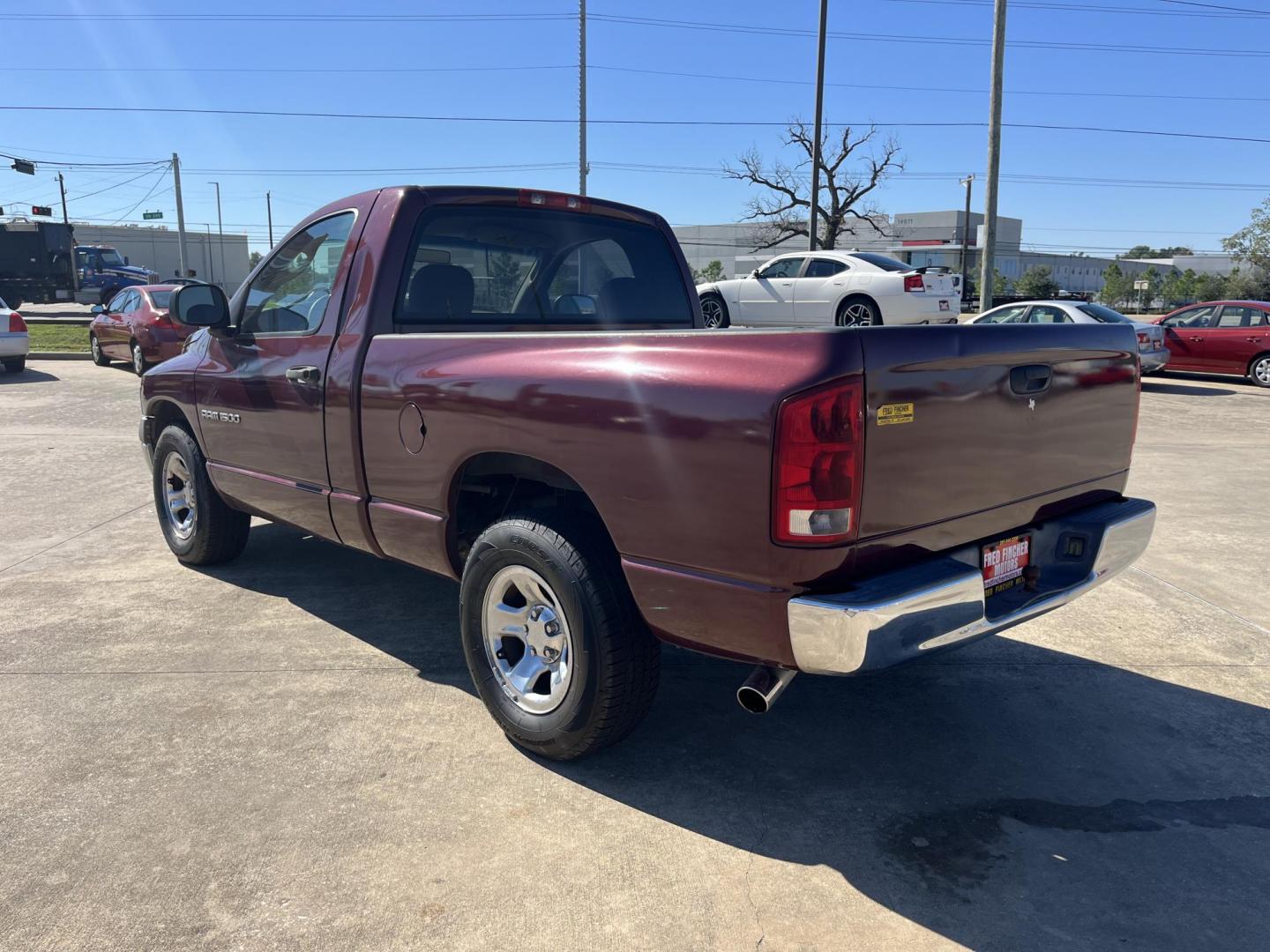 2002 maroom /black Dodge Ram 1500 SLT Long Bed 2WD (1D7HA16K52J) with an 3.7L V6 SOHC 12V engine, Automatic Overdrive transmission, located at 14700 Tomball Parkway 249, Houston, TX, 77086, (281) 444-2200, 29.928619, -95.504074 - Photo#4