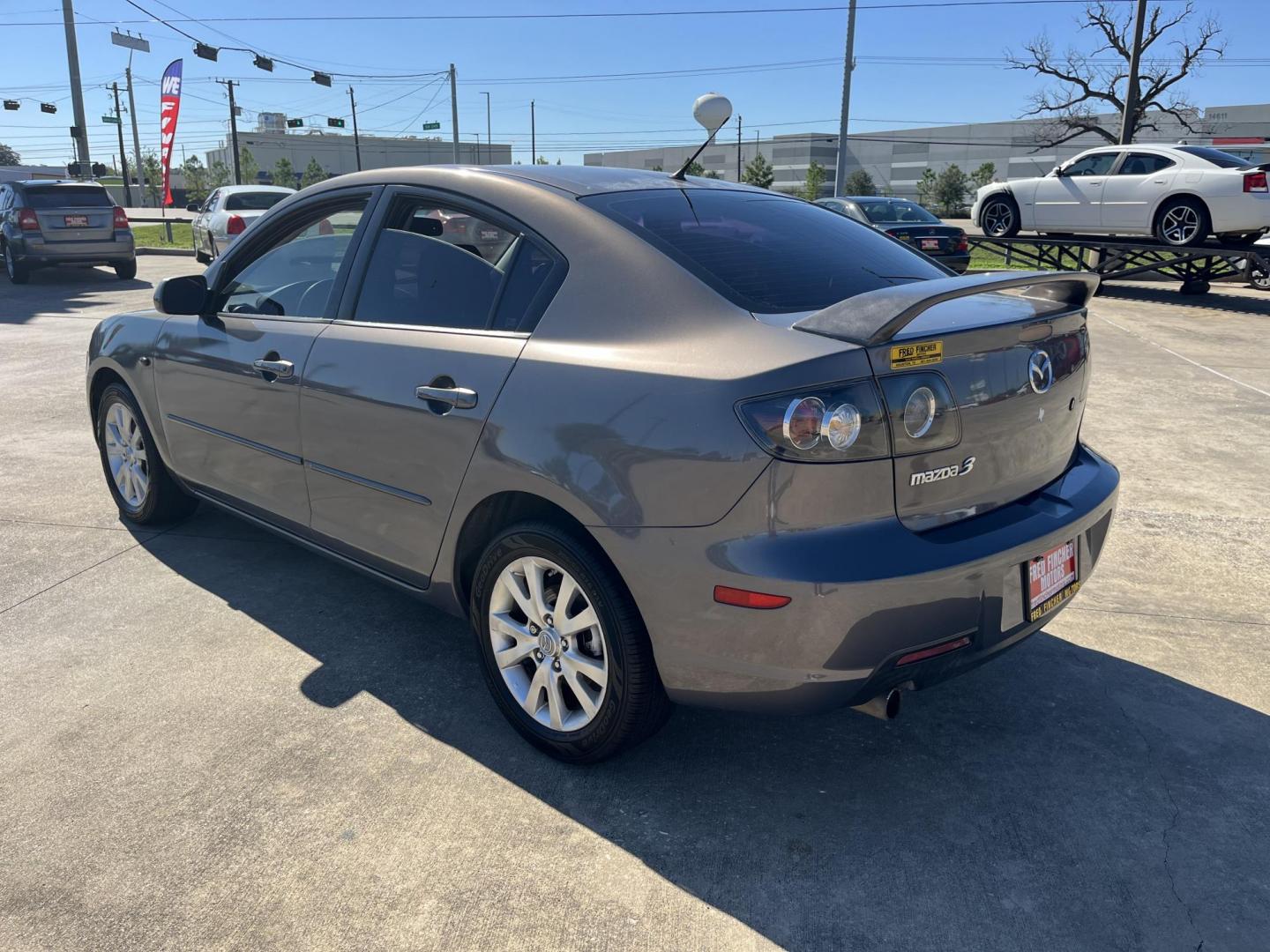 2007 GRAY /black Mazda MAZDA3 i Sport 4-Door (JM1BK12F171) with an 2.0L L4 DOHC 16V engine, Automatic Overdrive transmission, located at 14700 Tomball Parkway 249, Houston, TX, 77086, (281) 444-2200, 29.928619, -95.504074 - Photo#3