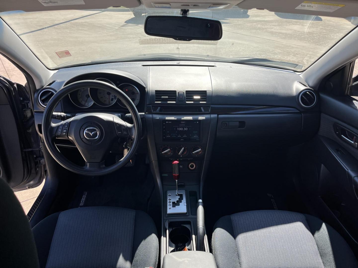 2007 GRAY /black Mazda MAZDA3 i Sport 4-Door (JM1BK12F171) with an 2.0L L4 DOHC 16V engine, Automatic Overdrive transmission, located at 14700 Tomball Parkway 249, Houston, TX, 77086, (281) 444-2200, 29.928619, -95.504074 - Photo#9