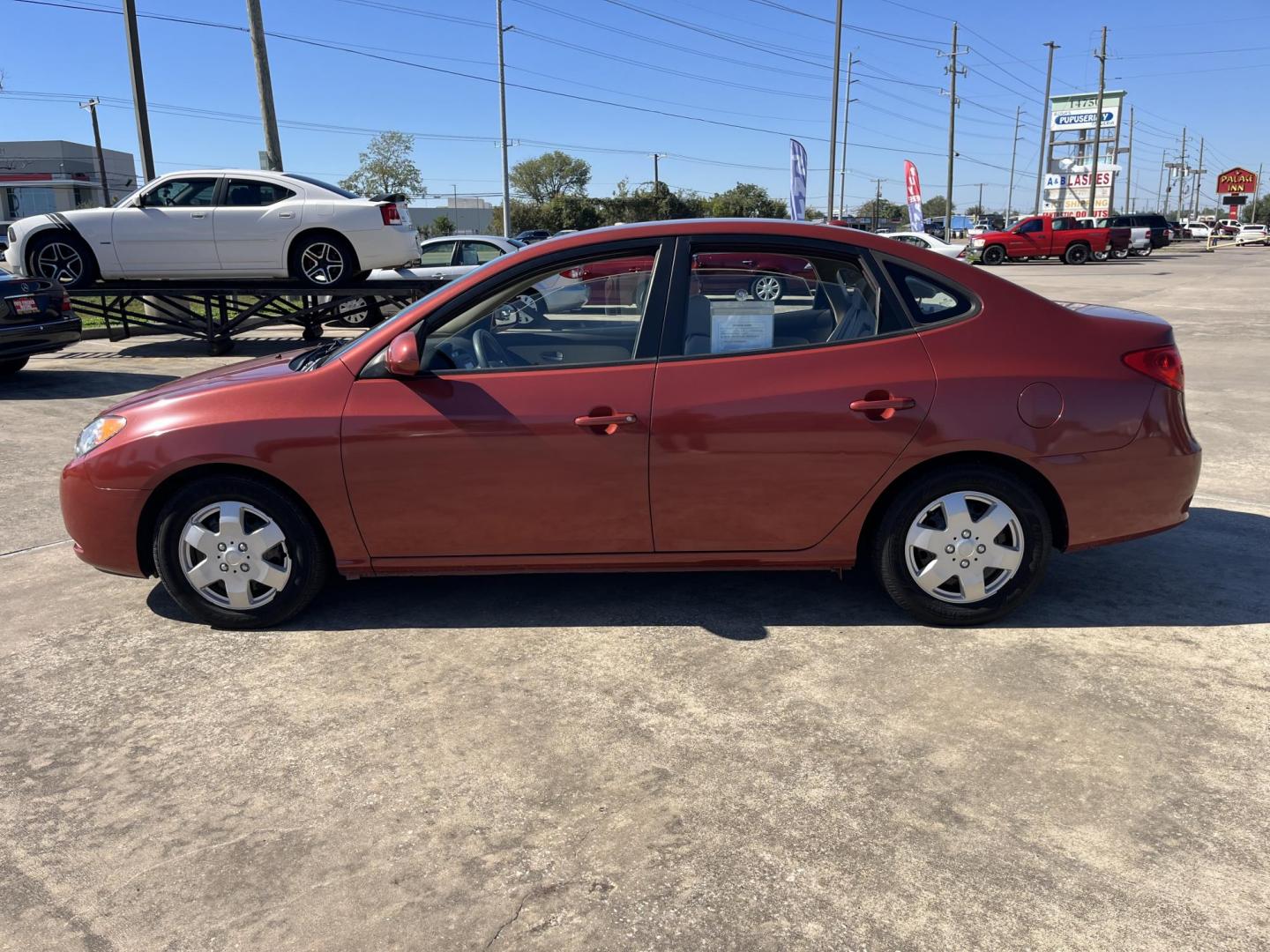 2008 red /black Hyundai Elantra GLS (KMHDU46D98U) with an 2.0L L4 DOHC 16V engine, Automatic Overdrive transmission, located at 14700 Tomball Parkway 249, Houston, TX, 77086, (281) 444-2200, 29.928619, -95.504074 - Photo#3