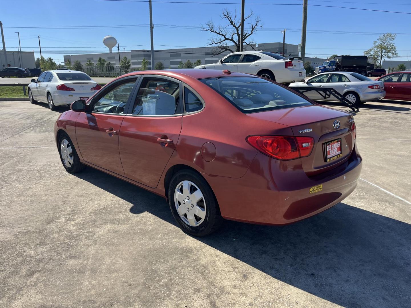 2008 red /black Hyundai Elantra GLS (KMHDU46D98U) with an 2.0L L4 DOHC 16V engine, Automatic Overdrive transmission, located at 14700 Tomball Parkway 249, Houston, TX, 77086, (281) 444-2200, 29.928619, -95.504074 - Photo#4