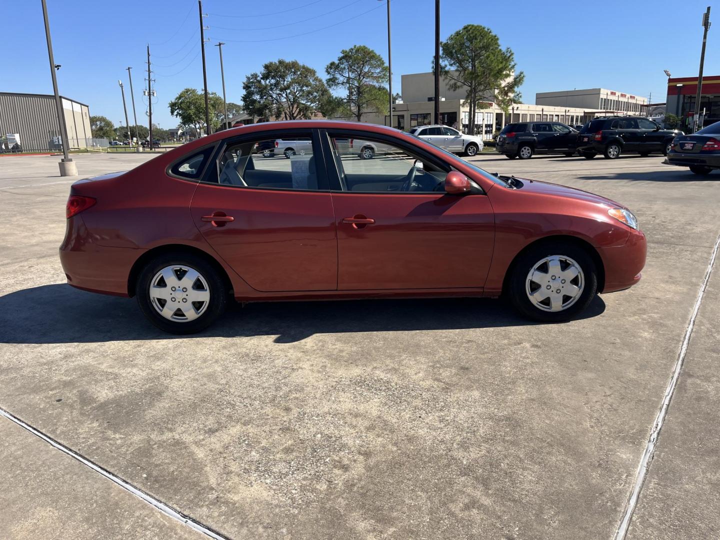 2008 red /black Hyundai Elantra GLS (KMHDU46D98U) with an 2.0L L4 DOHC 16V engine, Automatic Overdrive transmission, located at 14700 Tomball Parkway 249, Houston, TX, 77086, (281) 444-2200, 29.928619, -95.504074 - Photo#6