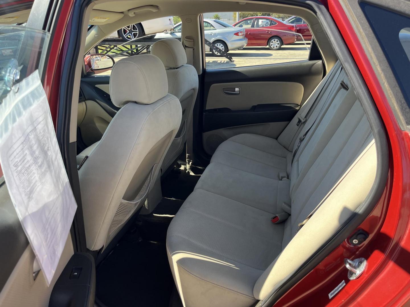 2008 red /black Hyundai Elantra GLS (KMHDU46D98U) with an 2.0L L4 DOHC 16V engine, Automatic Overdrive transmission, located at 14700 Tomball Parkway 249, Houston, TX, 77086, (281) 444-2200, 29.928619, -95.504074 - Photo#9