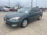 2005 green /TAN Toyota Camry LE (4T1BE32K35U) with an 2.4L L4 DOHC 16V engine, Automatic Overdrive transmission, located at 14700 Tomball Parkway 249, Houston, TX, 77086, (281) 444-2200, 29.928619, -95.504074 - Photo#2