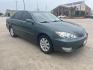 2005 green /TAN Toyota Camry LE (4T1BE32K35U) with an 2.4L L4 DOHC 16V engine, Automatic Overdrive transmission, located at 14700 Tomball Parkway 249, Houston, TX, 77086, (281) 444-2200, 29.928619, -95.504074 - Photo#0