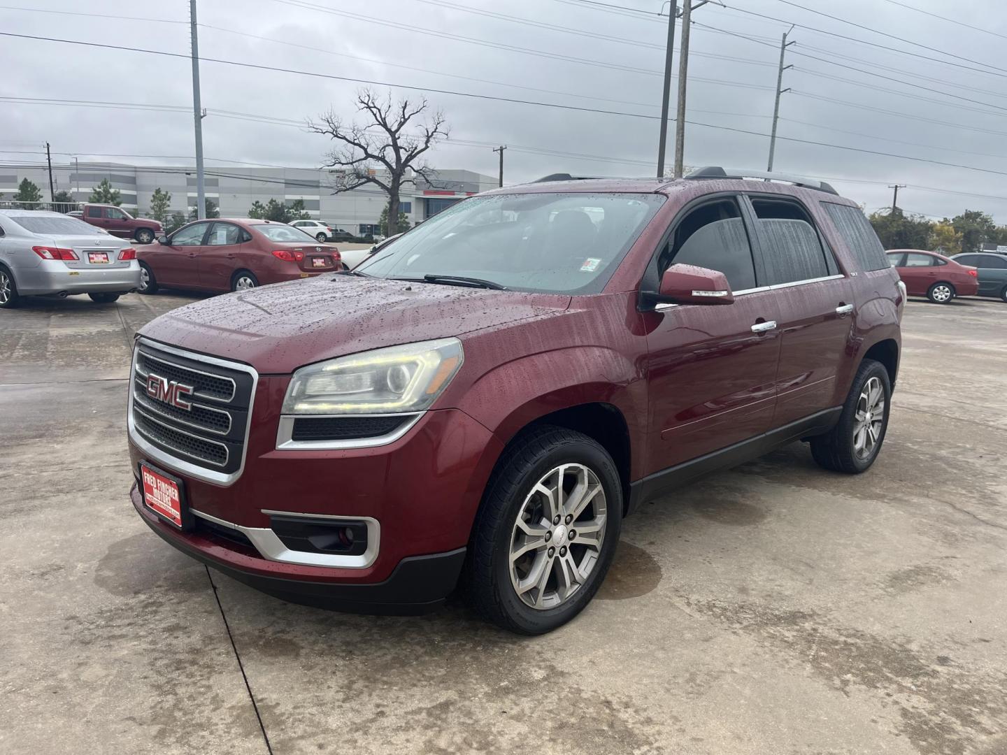 2015 red /TAN GMC Acadia SLT-1 AWD (1GKKVRKD7FJ) with an 3.6L V6 DOHC 24V engine, 6-Speed Automatic transmission, located at 14700 Tomball Parkway 249, Houston, TX, 77086, (281) 444-2200, 29.928619, -95.504074 - Photo#2