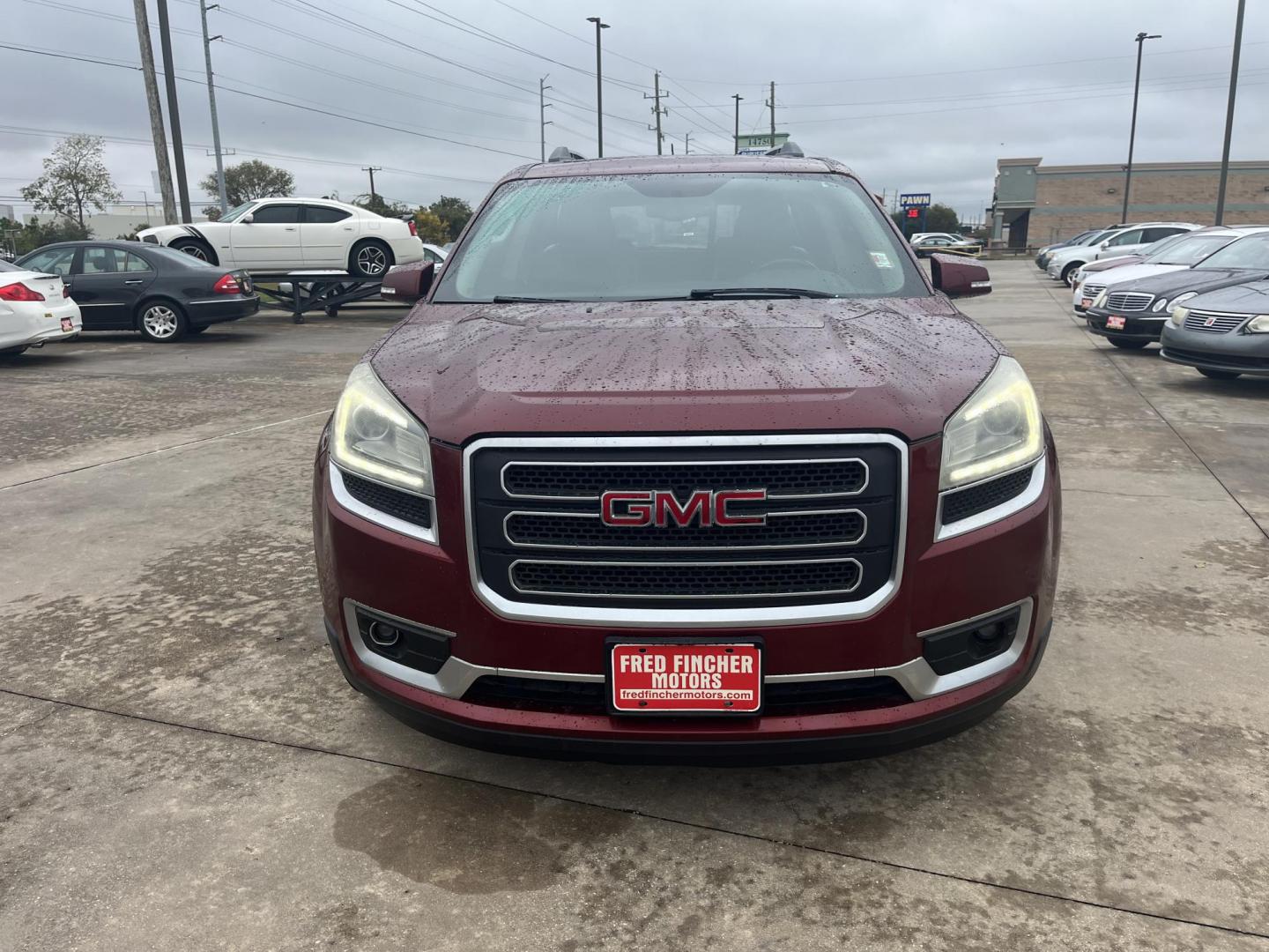 2015 red /TAN GMC Acadia SLT-1 AWD (1GKKVRKD7FJ) with an 3.6L V6 DOHC 24V engine, 6-Speed Automatic transmission, located at 14700 Tomball Parkway 249, Houston, TX, 77086, (281) 444-2200, 29.928619, -95.504074 - Photo#1