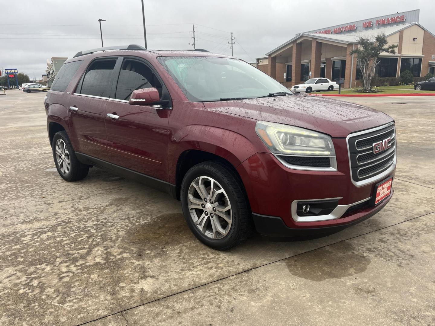 2015 red /TAN GMC Acadia SLT-1 AWD (1GKKVRKD7FJ) with an 3.6L V6 DOHC 24V engine, 6-Speed Automatic transmission, located at 14700 Tomball Parkway 249, Houston, TX, 77086, (281) 444-2200, 29.928619, -95.504074 - Photo#0