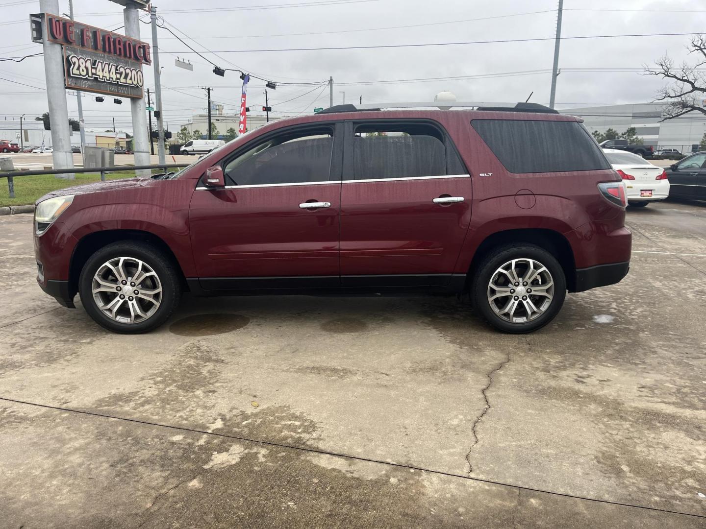 2015 red /TAN GMC Acadia SLT-1 AWD (1GKKVRKD7FJ) with an 3.6L V6 DOHC 24V engine, 6-Speed Automatic transmission, located at 14700 Tomball Parkway 249, Houston, TX, 77086, (281) 444-2200, 29.928619, -95.504074 - Photo#3