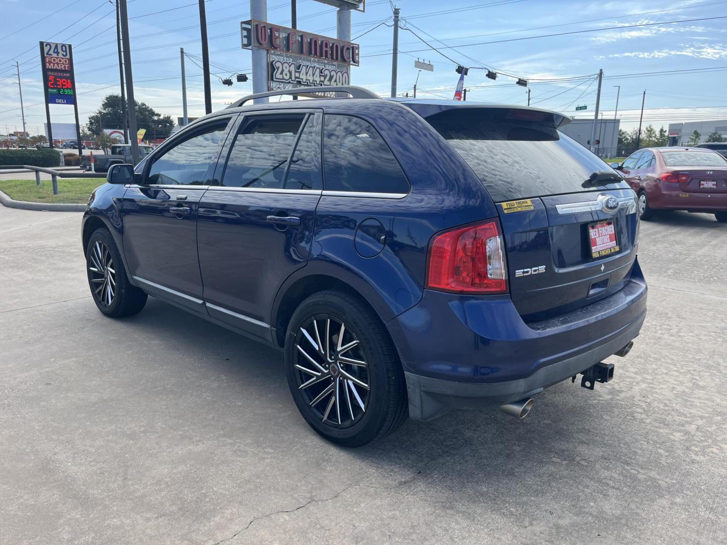 2011 blue Ford Edge Limited FWD (2FMDK3KC9BB) with an 3.5L V6 DOHC 24V engine, 6-Speed Automatic transmission, located at 14700 Tomball Parkway 249, Houston, TX, 77086, (281) 444-2200, 29.928619, -95.504074 - Photo#4