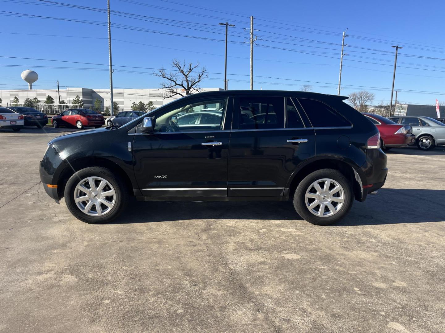 2010 Black /TAN Lincoln MKX FWD (2LMDJ6JC9AB) with an 3.5L V6 DOHC 24V engine, 6-Speed Automatic transmission, located at 14700 Tomball Parkway 249, Houston, TX, 77086, (281) 444-2200, 29.928619, -95.504074 - Photo#3