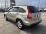 2007 GOLD /TAN Honda CR-V EX 2WD AT (JHLRE38597C) with an 2.4L L4 DOHC 16V engine, 5-Speed Automatic Overdrive transmission, located at 14700 Tomball Parkway 249, Houston, TX, 77086, (281) 444-2200, 29.928619, -95.504074 - Photo#4