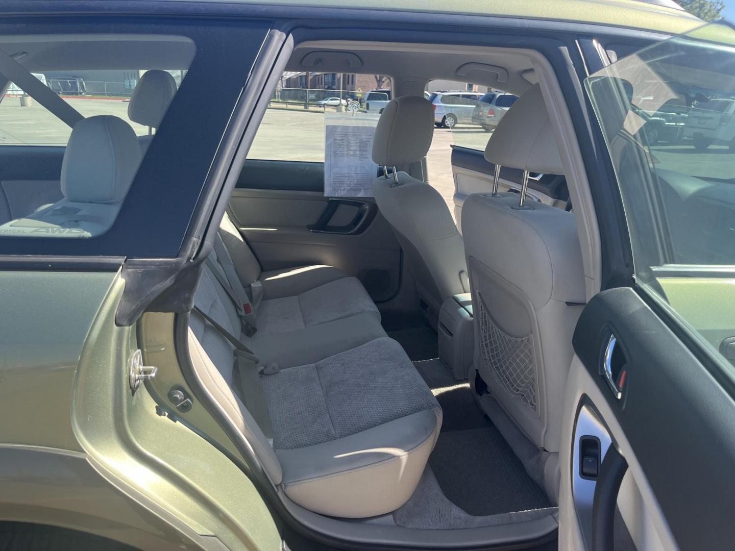 2006 green /gray Subaru Outback 2.5i Wagon (4S4BP61C967) with an 2.5L H4 SOHC 16V engine, 4-Speed Automatic Overdrive transmission, located at 14700 Tomball Parkway 249, Houston, TX, 77086, (281) 444-2200, 29.928619, -95.504074 - Photo#11