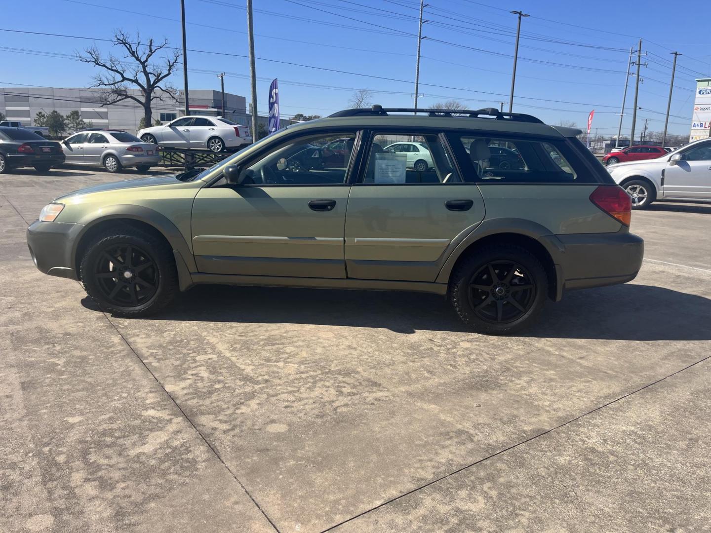 2006 green /gray Subaru Outback 2.5i Wagon (4S4BP61C967) with an 2.5L H4 SOHC 16V engine, 4-Speed Automatic Overdrive transmission, located at 14700 Tomball Parkway 249, Houston, TX, 77086, (281) 444-2200, 29.928619, -95.504074 - Photo#3