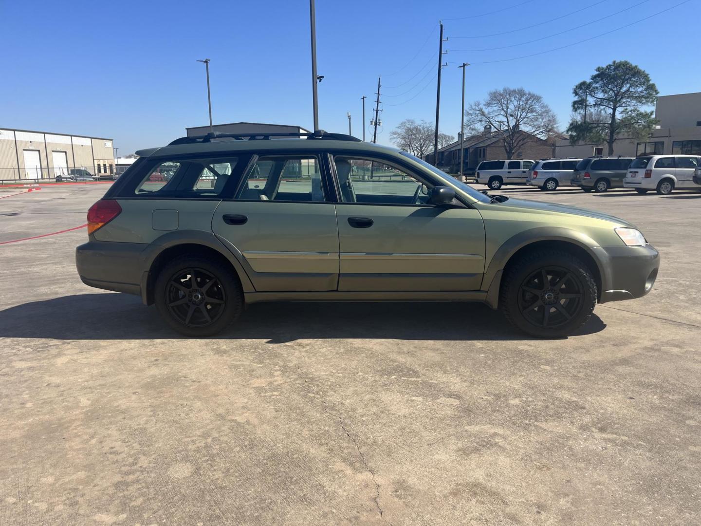 2006 green /gray Subaru Outback 2.5i Wagon (4S4BP61C967) with an 2.5L H4 SOHC 16V engine, 4-Speed Automatic Overdrive transmission, located at 14700 Tomball Parkway 249, Houston, TX, 77086, (281) 444-2200, 29.928619, -95.504074 - Photo#7