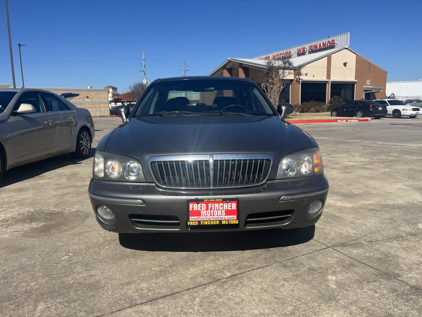 2002 green /TAN Hyundai XG350 Base (KMHFU45E52A) with an 3.5L V6 DOHC 24V engine, 5-Speed Automatic Overdrive transmission, located at 14700 Tomball Parkway 249, Houston, TX, 77086, (281) 444-2200, 29.928619, -95.504074 - Photo#1