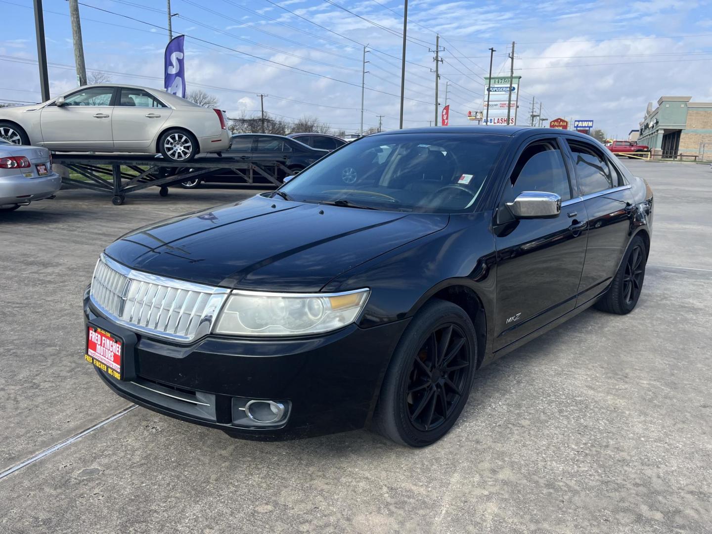 2007 black /black Lincoln MKZ FWD (3LNHM26T37R) with an 3.5L V6 DOHC 24V engine, 6-Speed Automatic Overdrive transmission, located at 14700 Tomball Parkway 249, Houston, TX, 77086, (281) 444-2200, 29.928619, -95.504074 - Photo#2