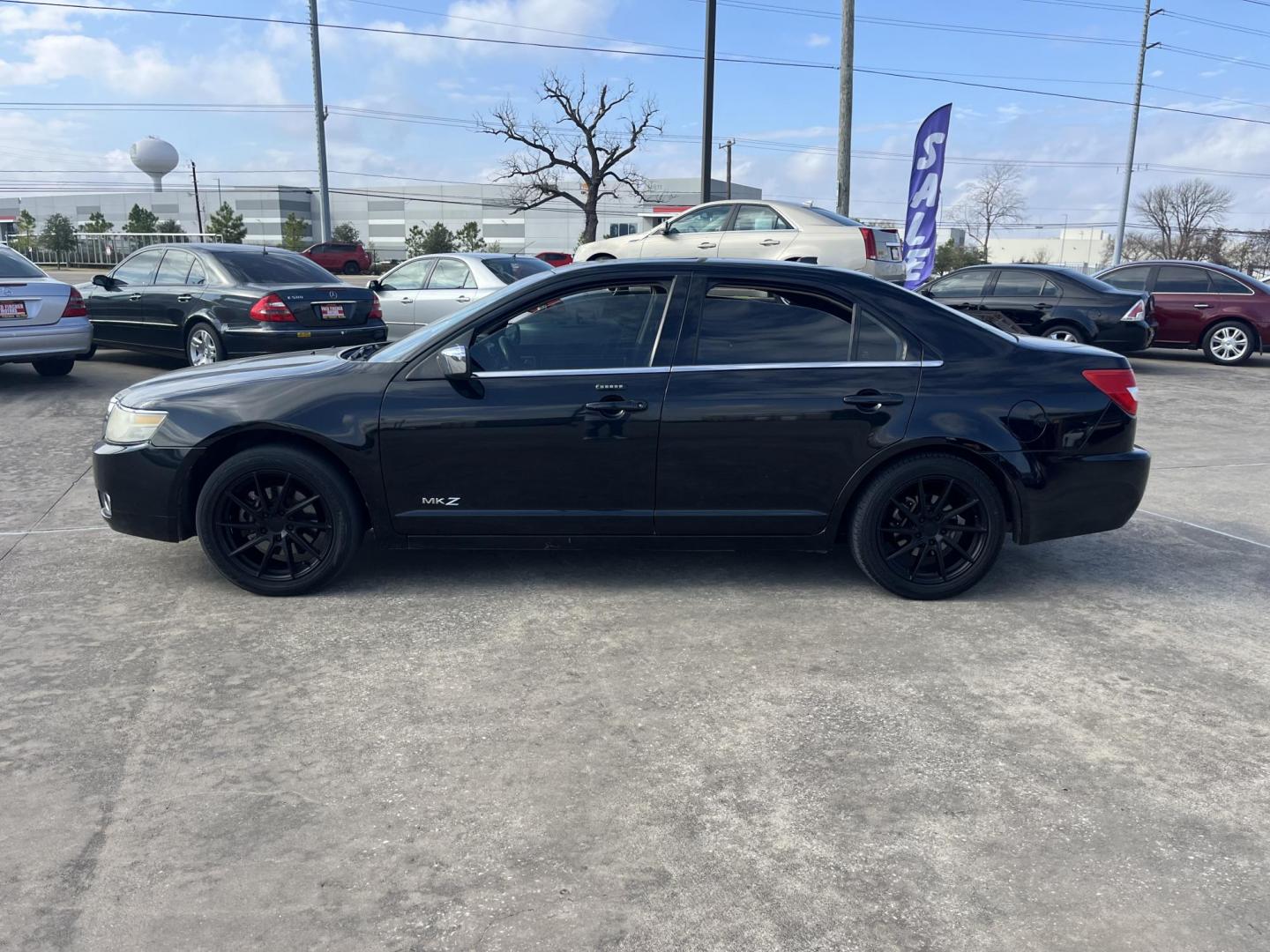 2007 black /black Lincoln MKZ FWD (3LNHM26T37R) with an 3.5L V6 DOHC 24V engine, 6-Speed Automatic Overdrive transmission, located at 14700 Tomball Parkway 249, Houston, TX, 77086, (281) 444-2200, 29.928619, -95.504074 - Photo#3