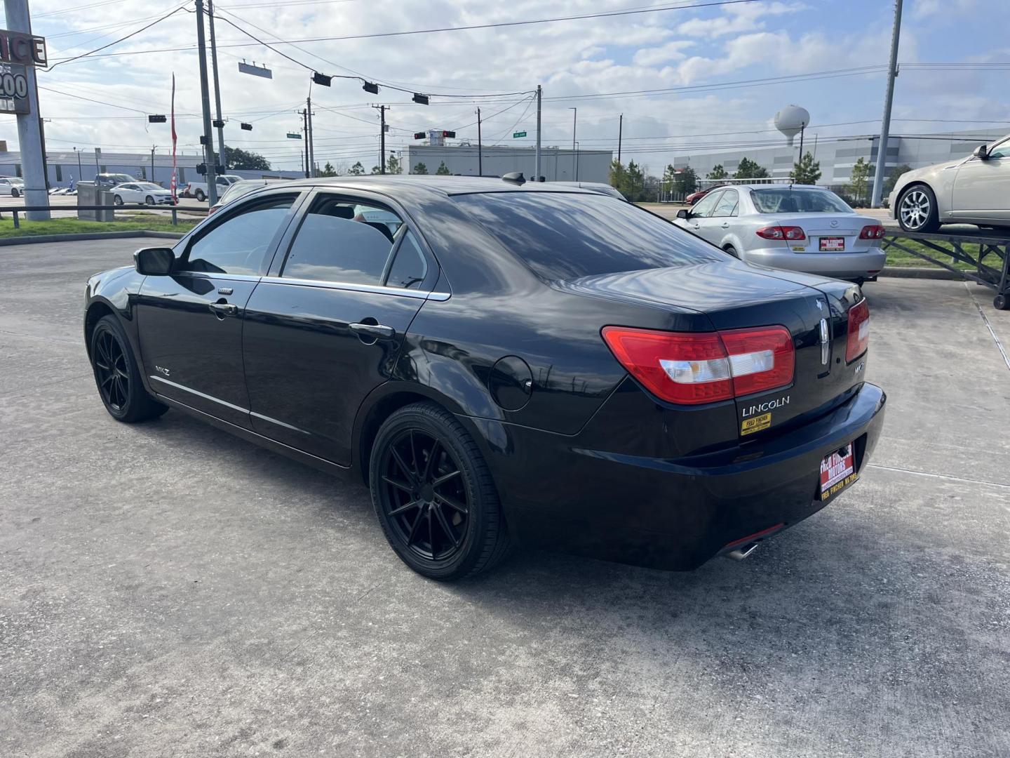 2007 black /black Lincoln MKZ FWD (3LNHM26T37R) with an 3.5L V6 DOHC 24V engine, 6-Speed Automatic Overdrive transmission, located at 14700 Tomball Parkway 249, Houston, TX, 77086, (281) 444-2200, 29.928619, -95.504074 - Photo#4