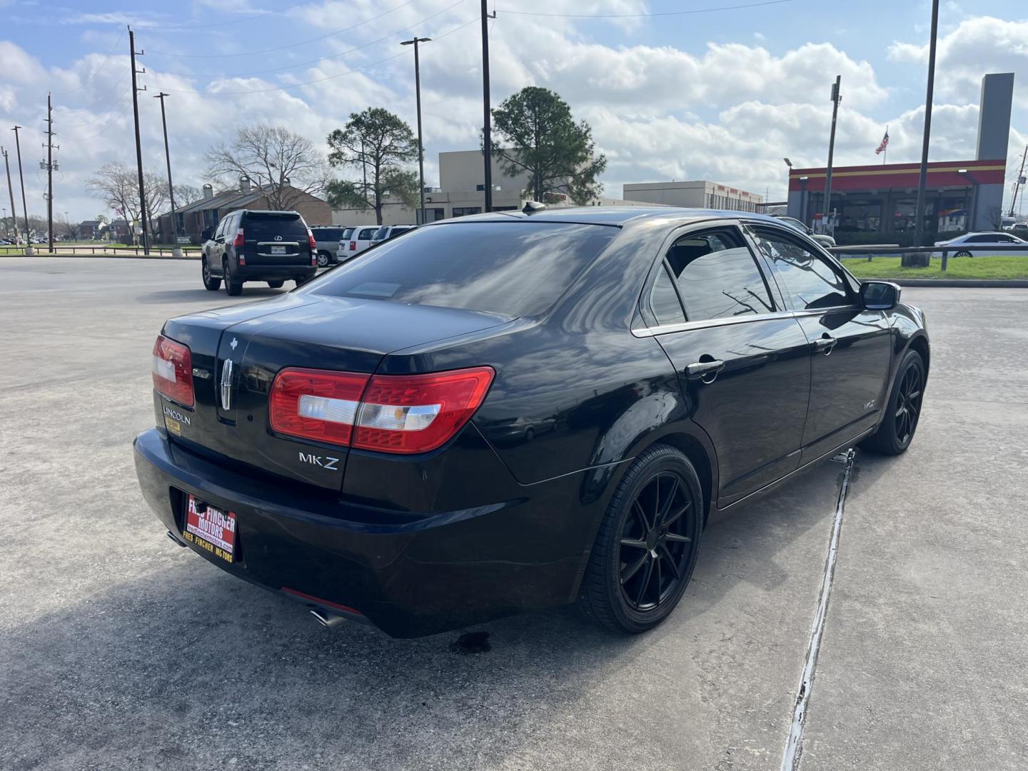 2007 black /black Lincoln MKZ FWD (3LNHM26T37R) with an 3.5L V6 DOHC 24V engine, 6-Speed Automatic Overdrive transmission, located at 14700 Tomball Parkway 249, Houston, TX, 77086, (281) 444-2200, 29.928619, -95.504074 - Photo#5