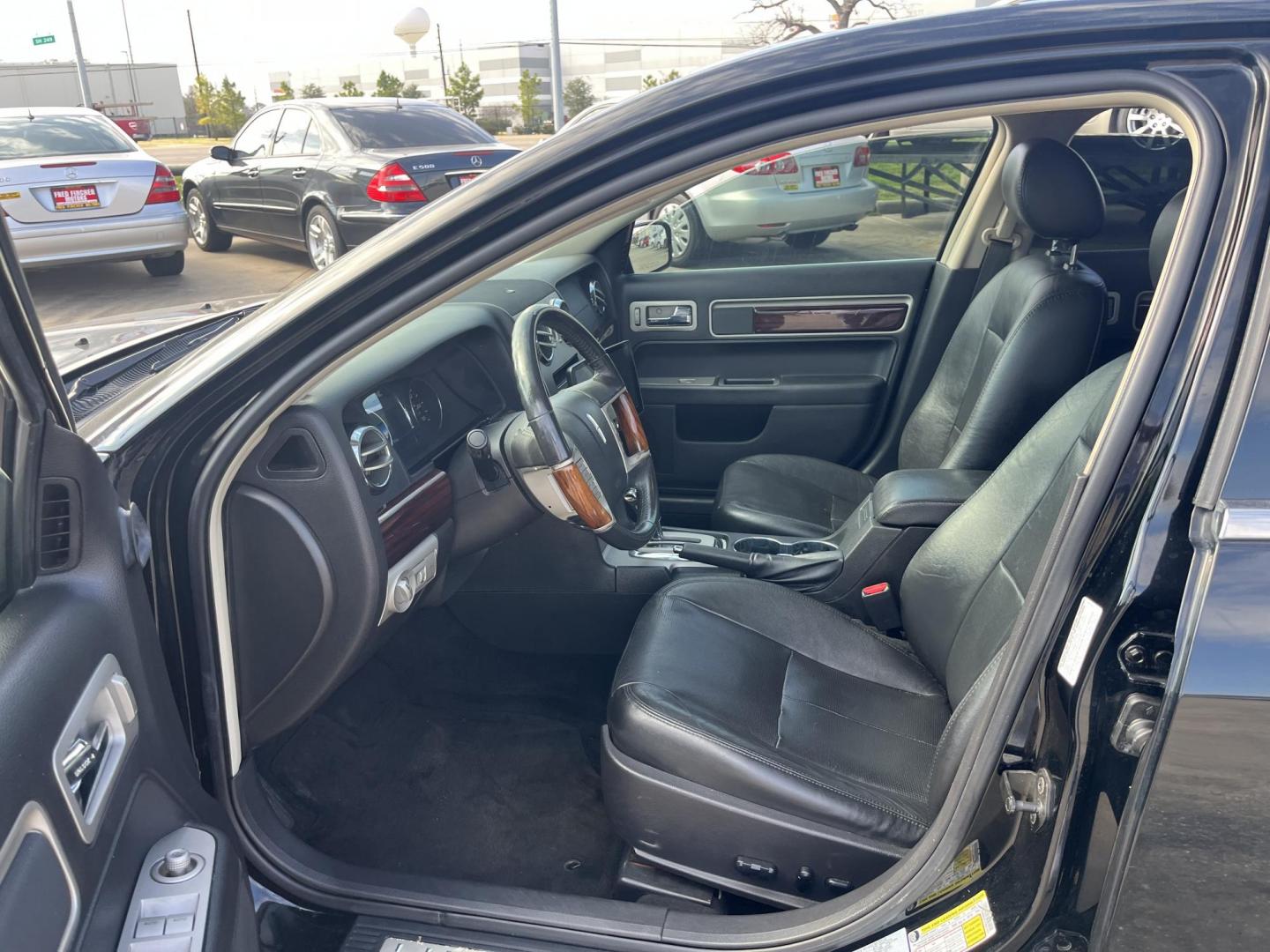 2007 black /black Lincoln MKZ FWD (3LNHM26T37R) with an 3.5L V6 DOHC 24V engine, 6-Speed Automatic Overdrive transmission, located at 14700 Tomball Parkway 249, Houston, TX, 77086, (281) 444-2200, 29.928619, -95.504074 - Photo#6