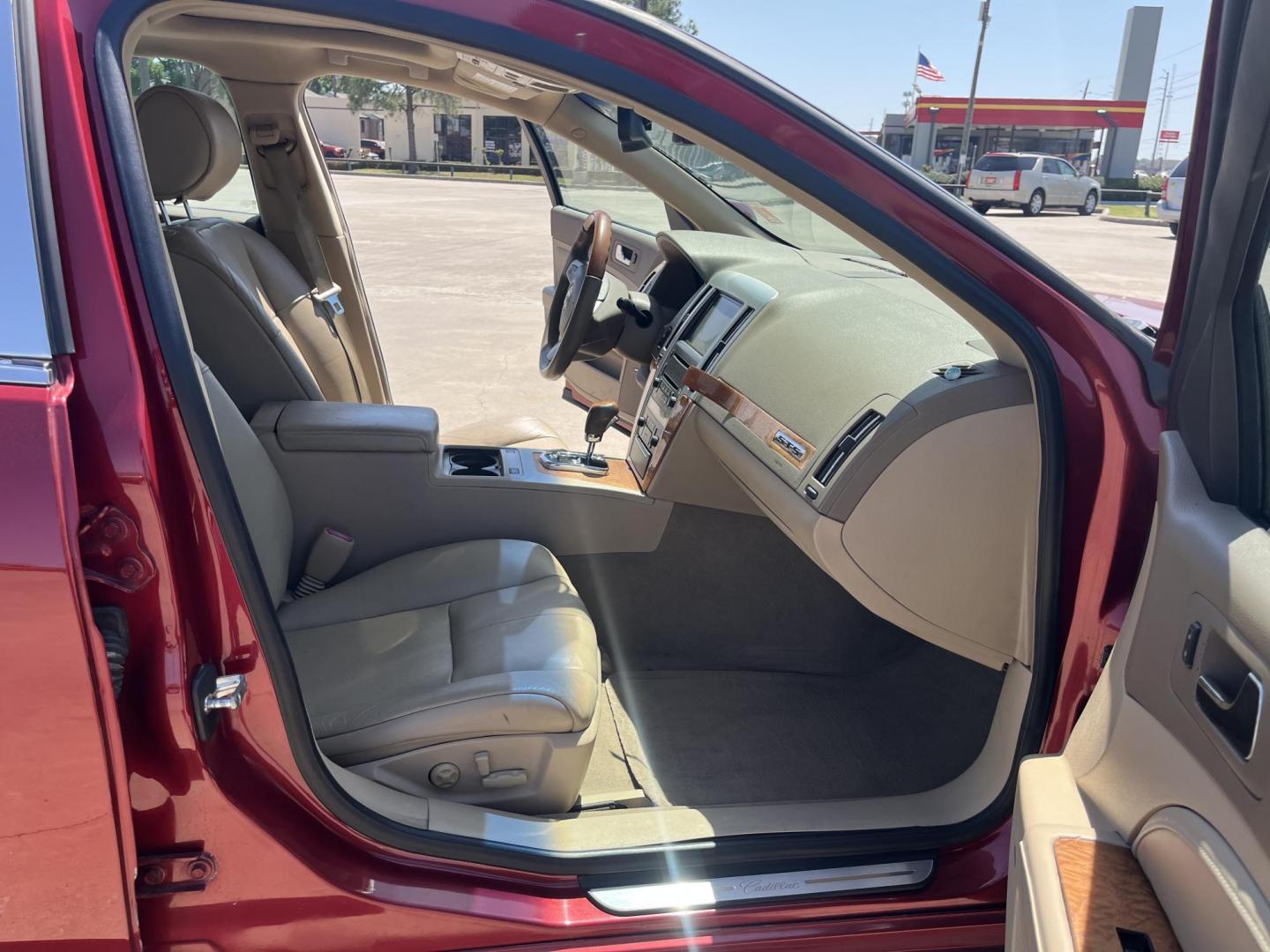 2011 red /TAN Cadillac STS V6 Luxury (1G6DW6ED7B0) with an 3.6L V6 DOHC 24V engine, 6-Speed Automatic transmission, located at 14700 Tomball Parkway 249, Houston, TX, 77086, (281) 444-2200, 29.928619, -95.504074 - Photo#13